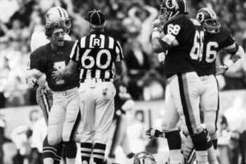  There was no love lost between Joe Theismann (left) and Dallas fans, even though the former...
