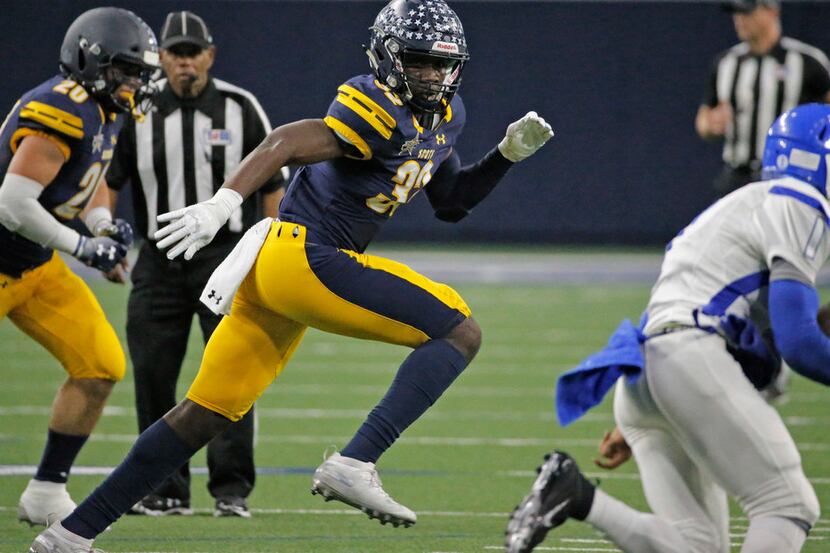 FILE - Highland Park defensive lineman Prince Dorbah (32) is pictured during a playoff game...