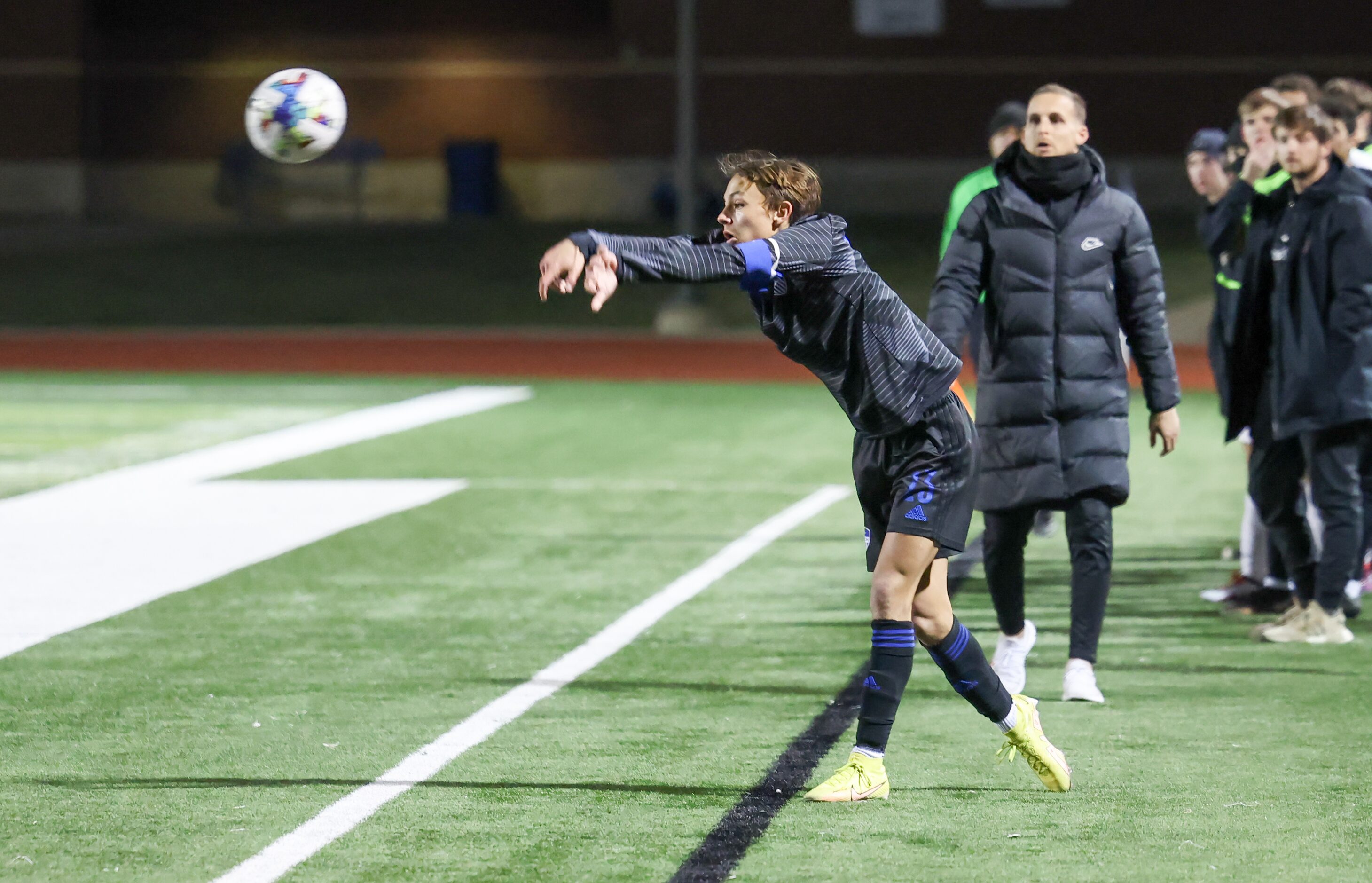 Hebron’s Joshua Flores (13) delivers a throw-in ball to a teammate as they play Flower Mound...