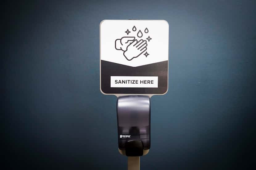 A sample hand sanitizing station is seen at the offices of Stand Up Stations in Irving. 