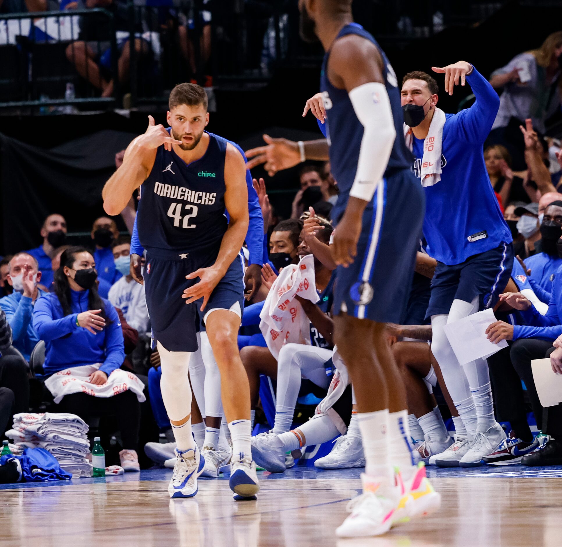 Dallas Mavericks forward Maxi Kleber (42) celebrates a score during the second quarter of...