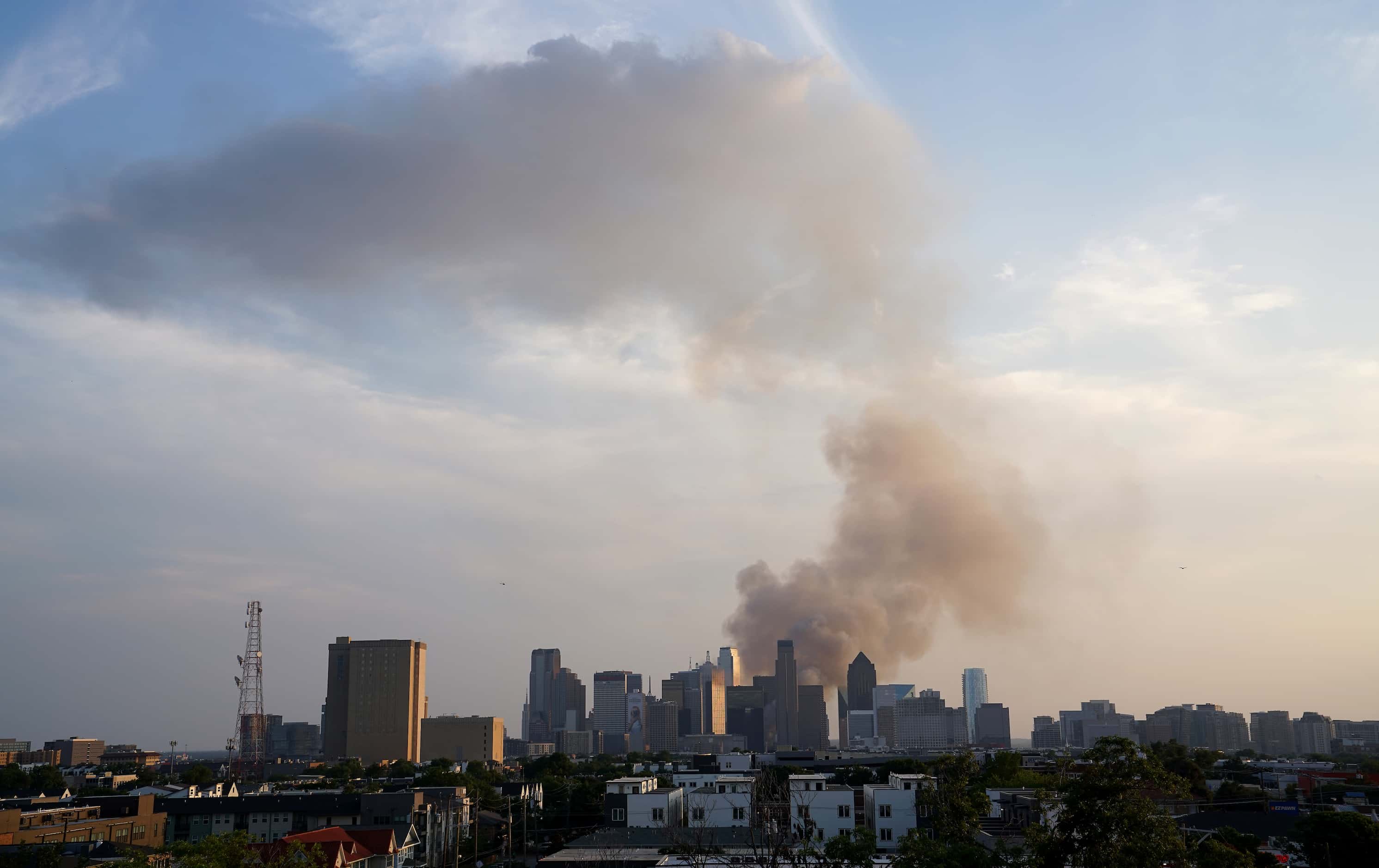 Smoke from a fire at First Baptist Dallas church rises over the city on Friday, July 19,...