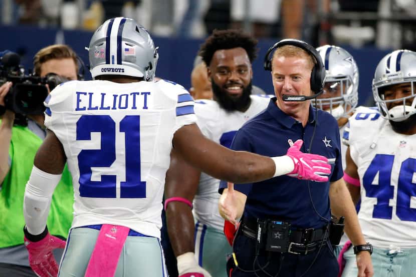 Dallas Cowboys running back Ezekiel Elliott (21) celebrates his long touchdown run with head...