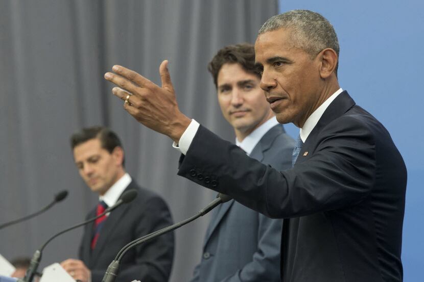 President Barack Obama, accompanied by Canadian Prime Minister Justin Trudeau and Mexican...