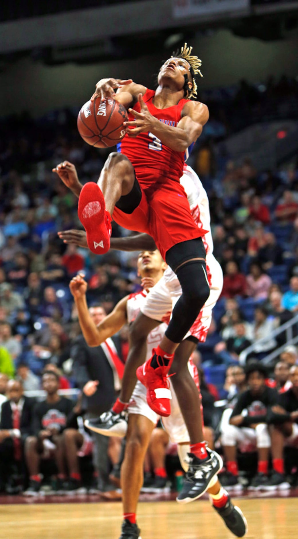 Duncanville's Jahmi'us Ramsey #3 drives to the basket. UIL boys basketball 6A State...