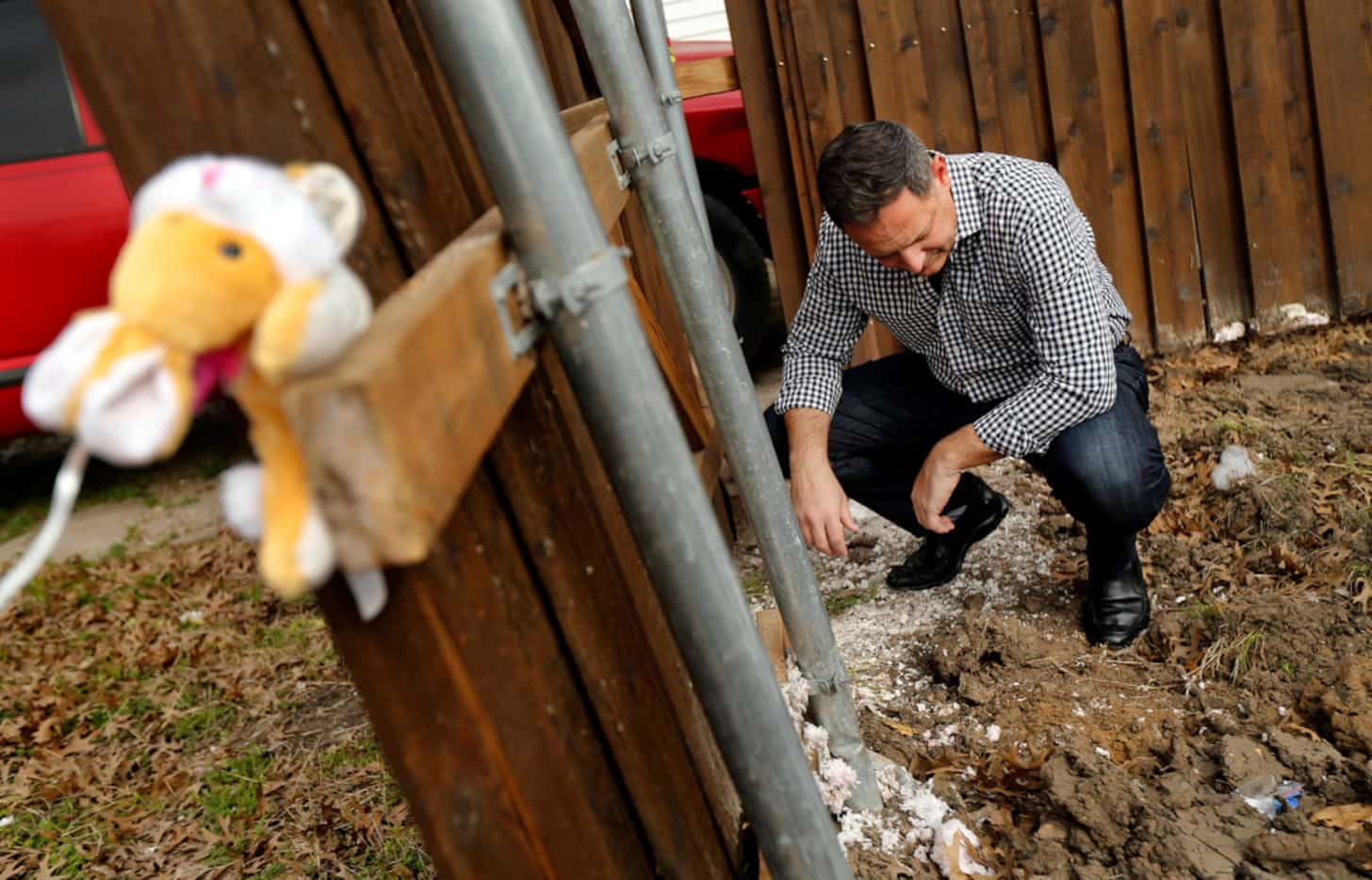 Rep. Rafael Anchia inspects debris left behind after a demolition crew razed the remnants of...