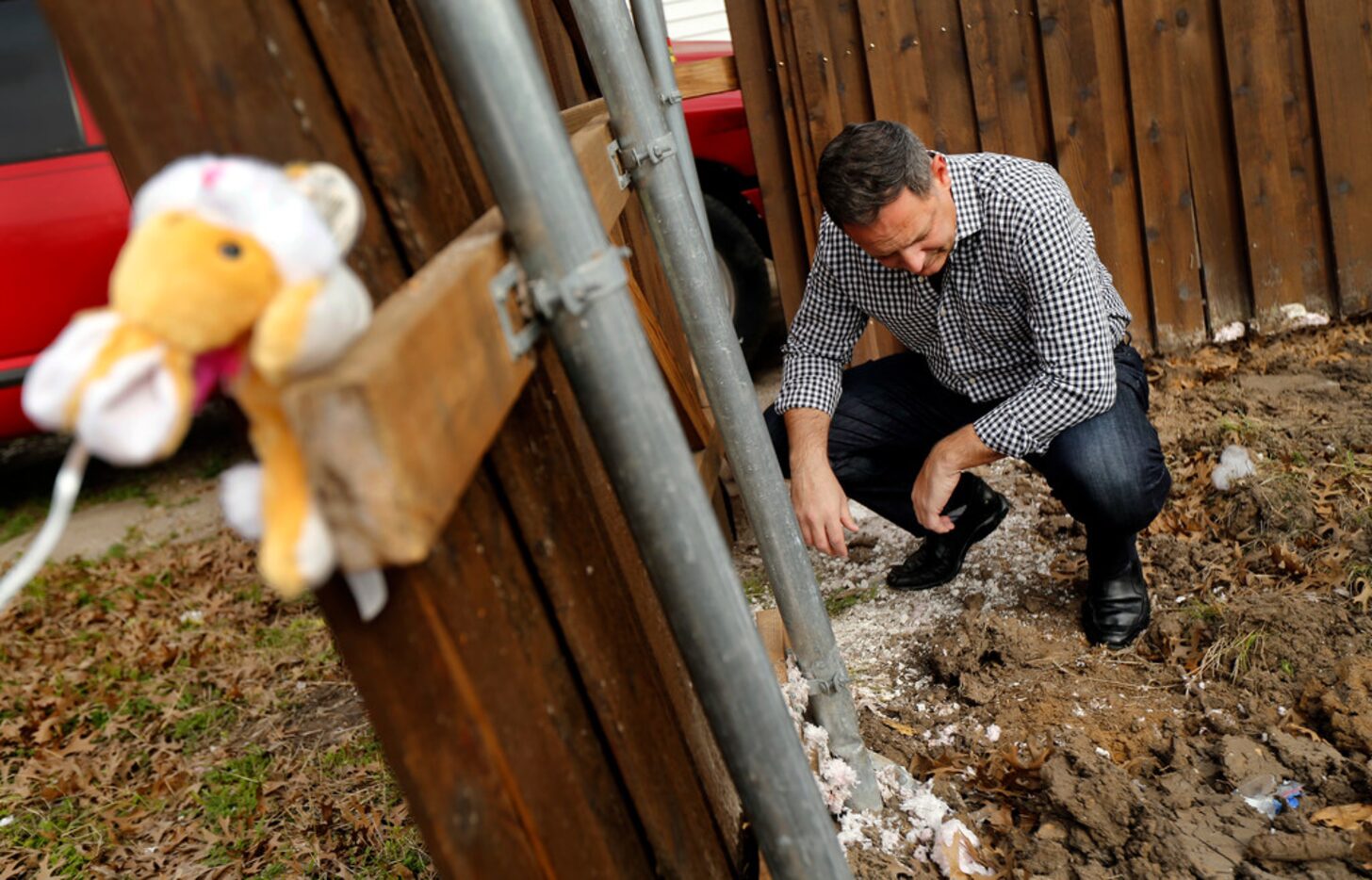 Rep. Rafael Anchia inspects debris left behind after a demolition crew razed the remnants of...