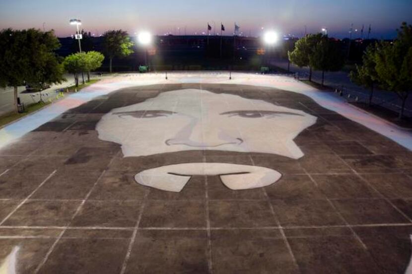 
More than 700 volunteers spent 13 hours creating a 17,000-square-foot chalk portrait of...