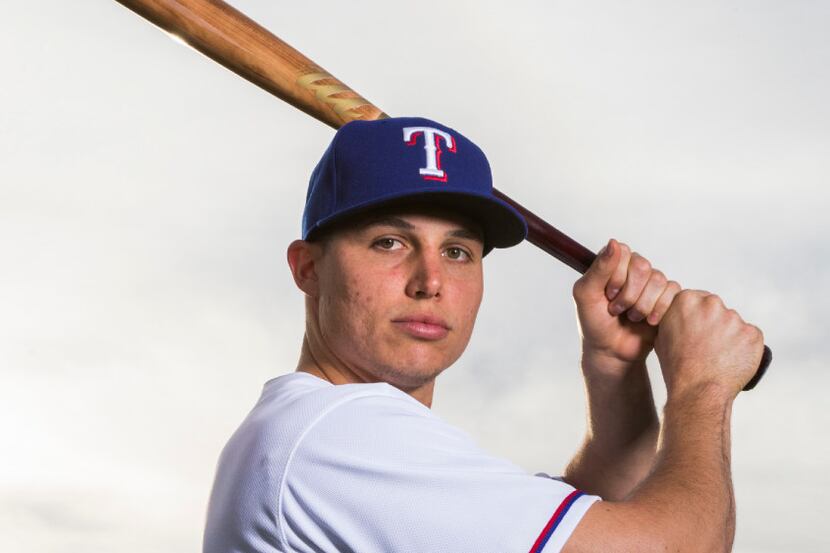 Texas Rangers third baseman Drew Robinson (68) poses for a portrait on photo day during...