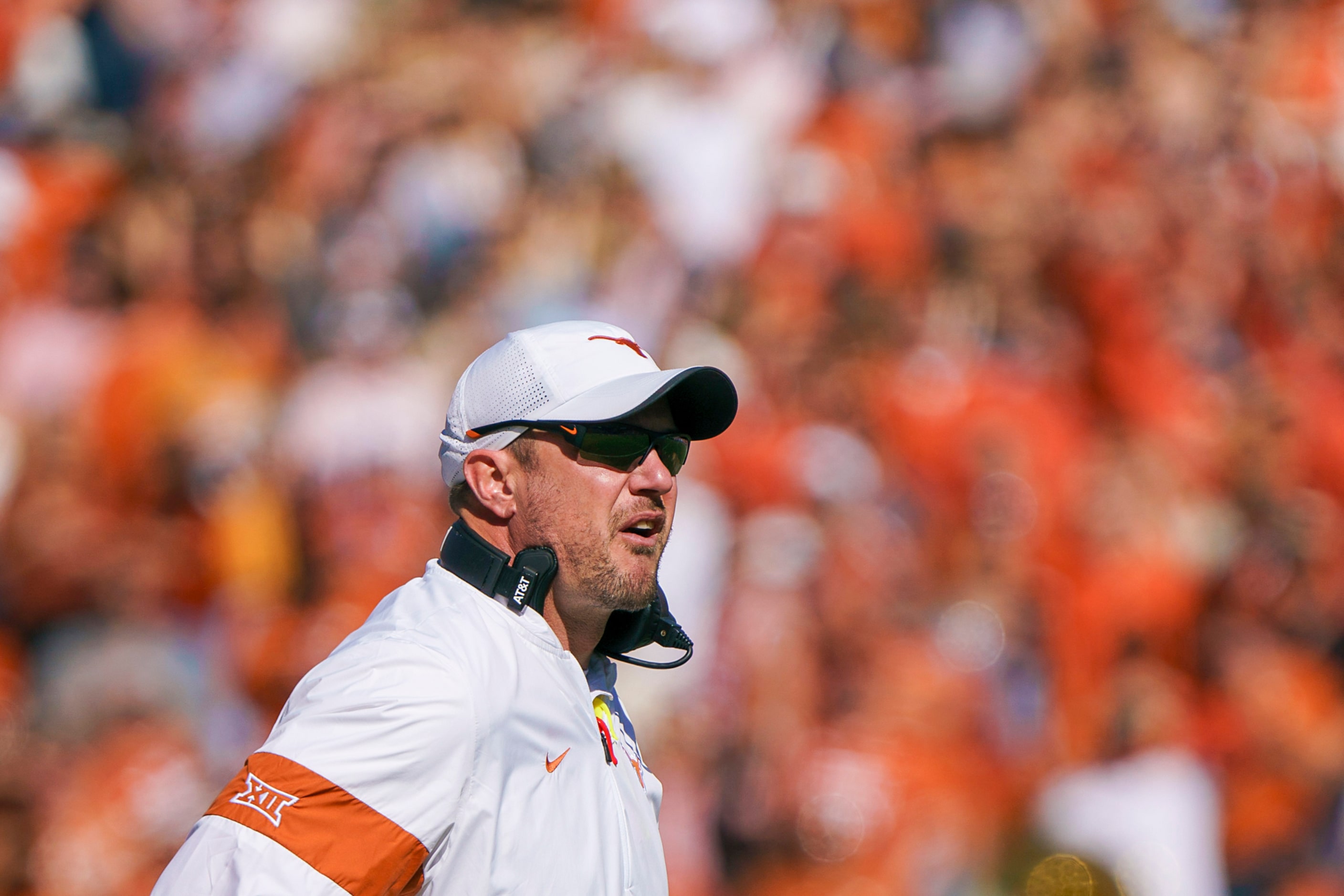 Texas head coach Tom Herman watches from the sidelines during the first half of an NCAA...