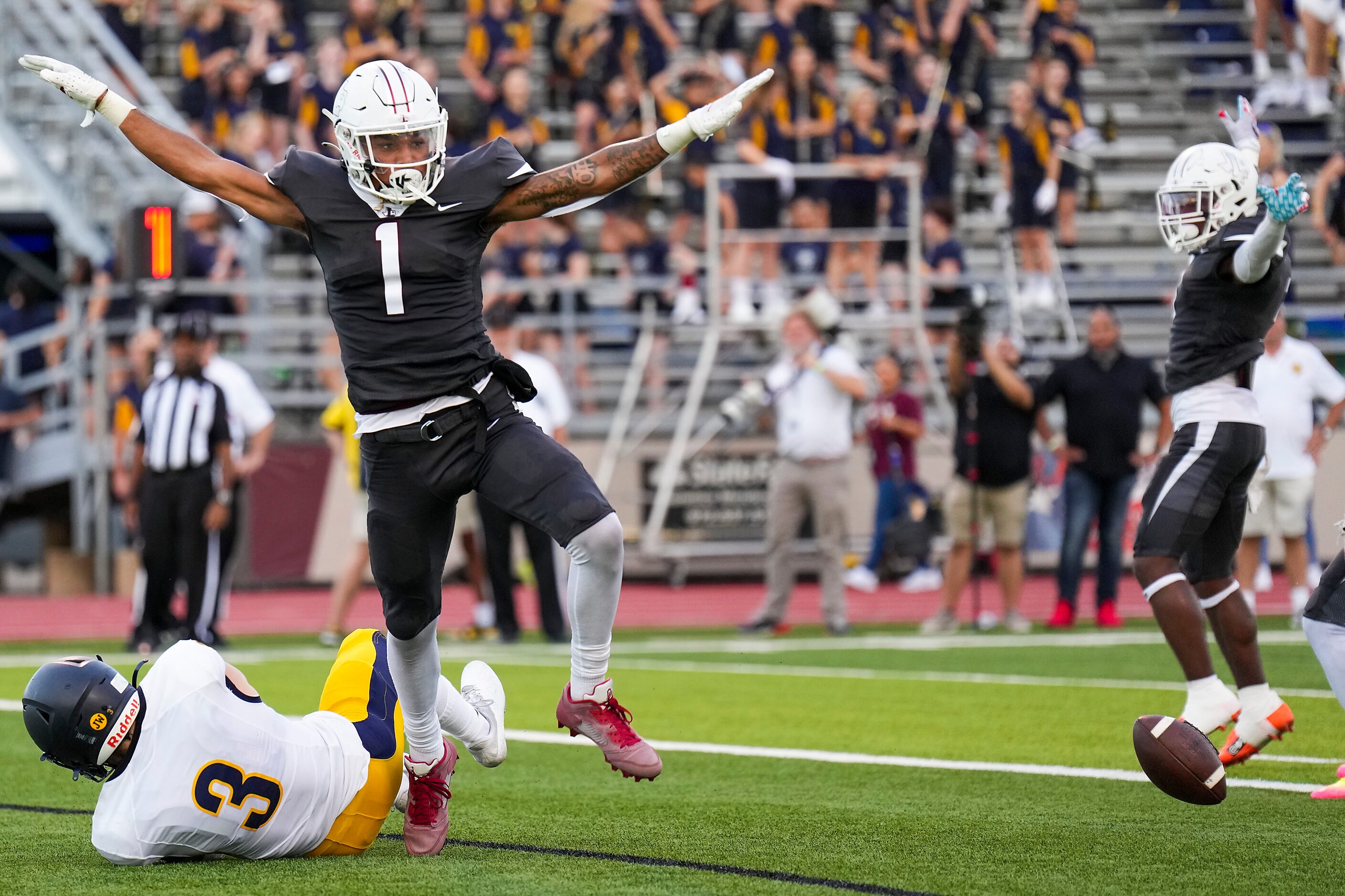 Lewisville defensive back Jaydan Hardy (1) celebrates after breaking up a pass intended for...