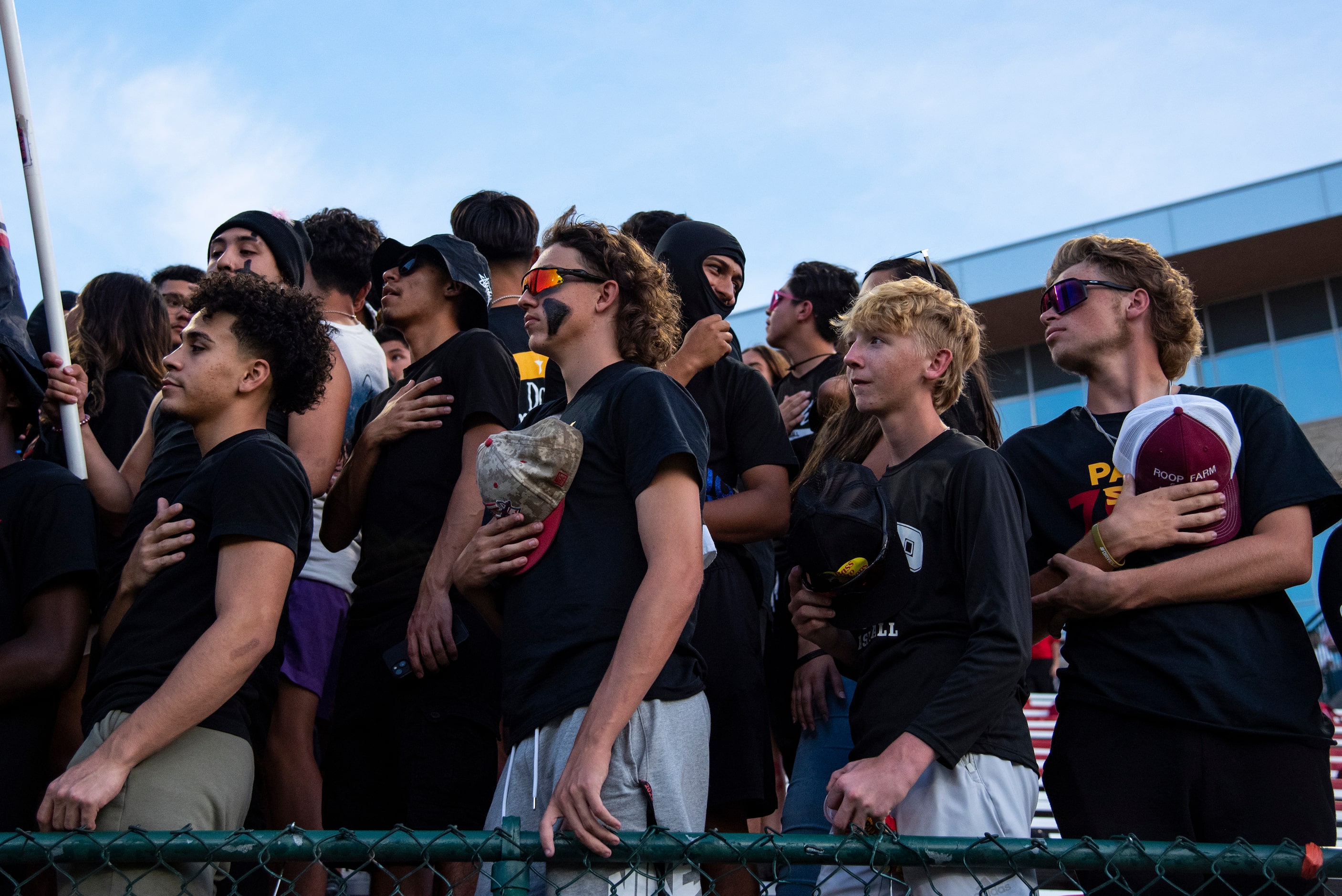 Students in the South Grand Prairie stand for the national anthem prior to the start of...