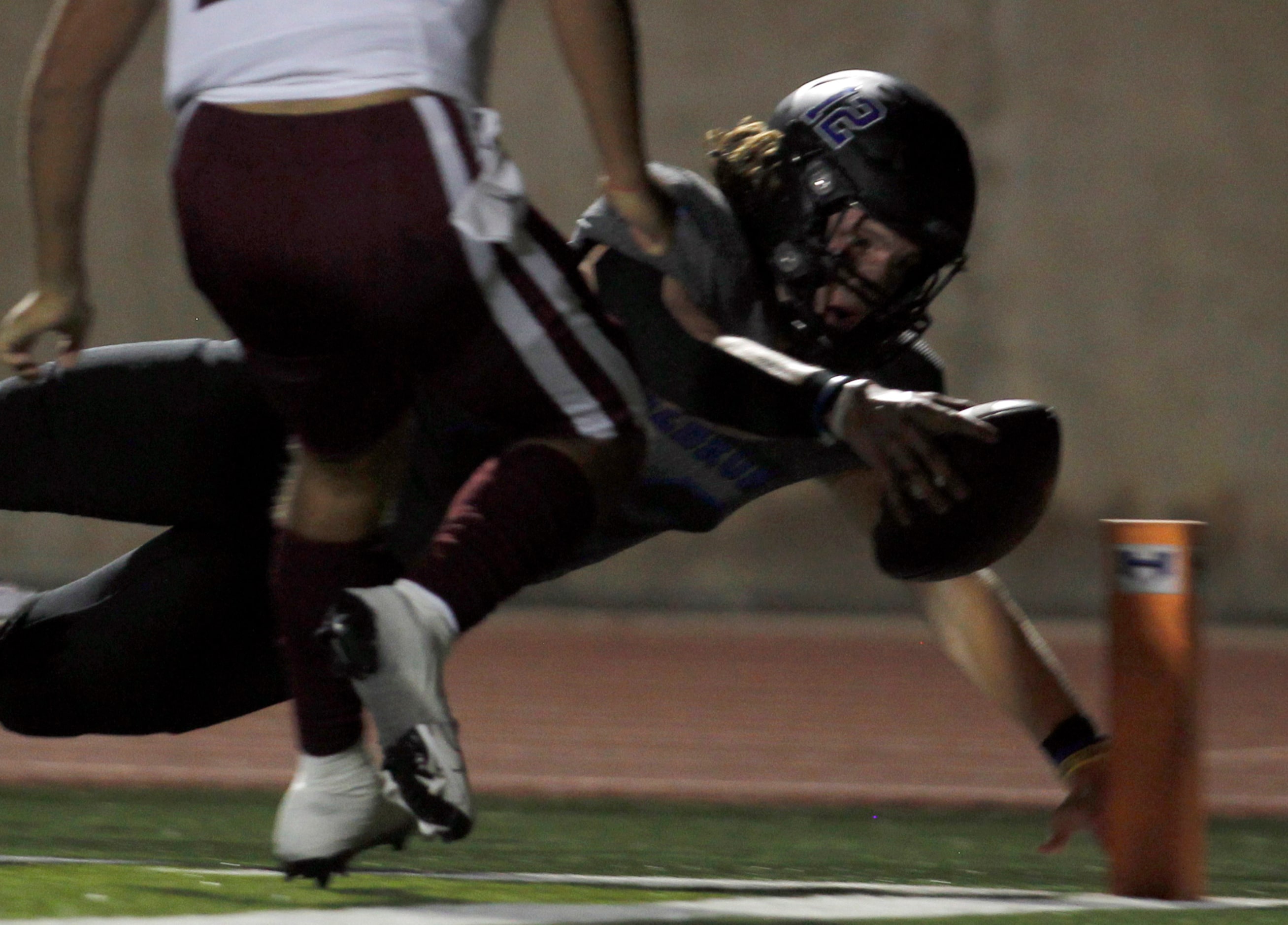 Hebron linebacker Carter Brock (12) dives toward the pylon but was marked short of the goal...