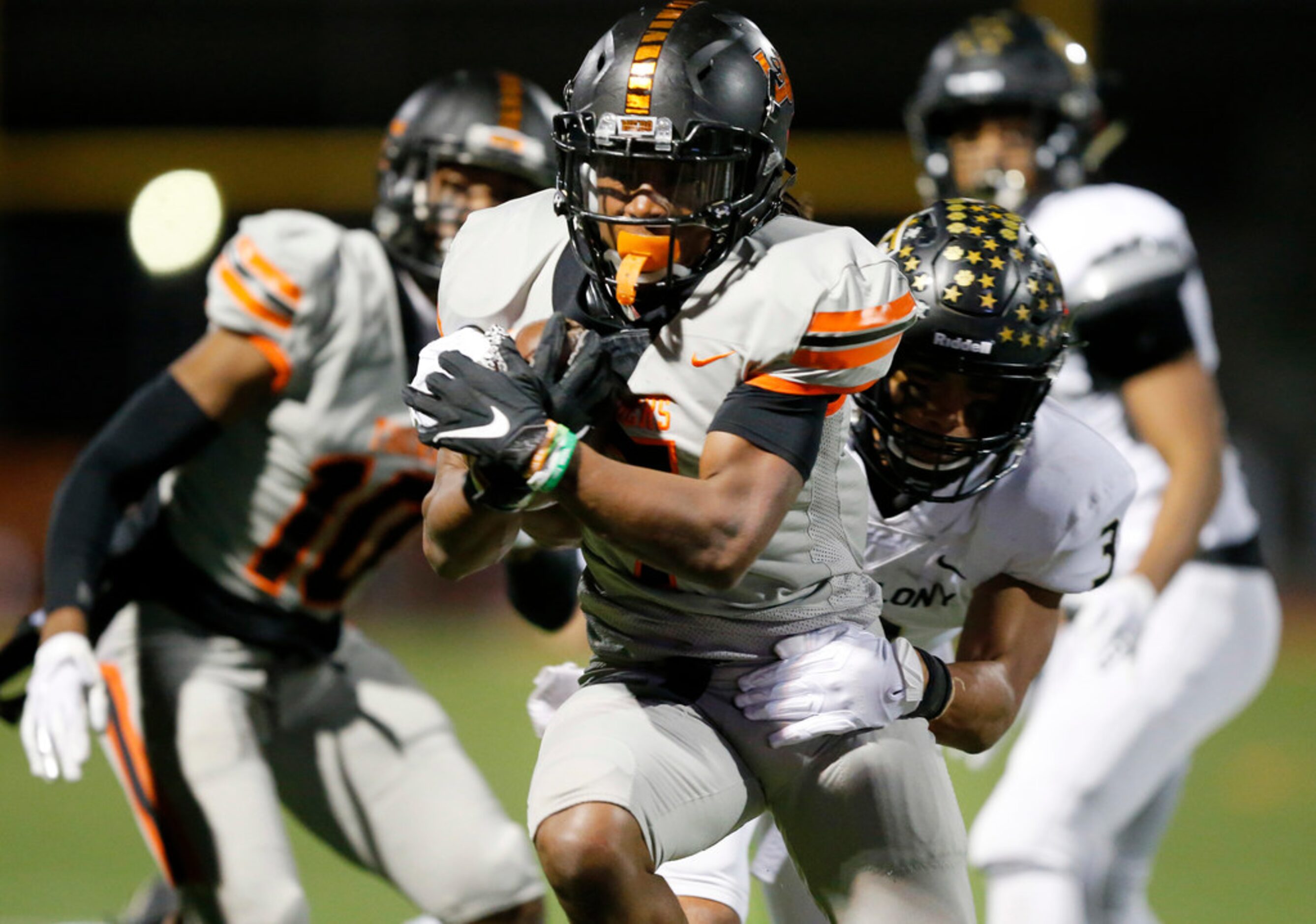 Lancaster running back Karon Neblett (7) runs for a fourth quarter first down setting up a...