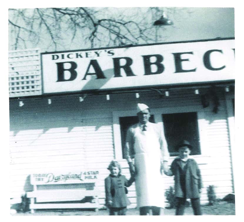 One of the oldest Dickey's photos, from 1946, shows founder Travis Dickey (center) in front...