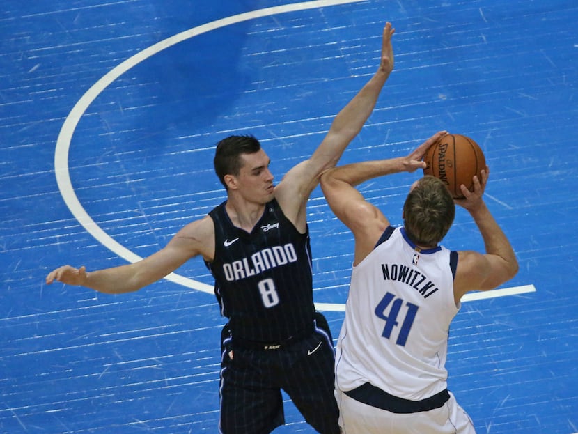 Dallas Mavericks forward Dirk Nowitzki (41) shoots over Orlando Magic guard Mario Hezonja...