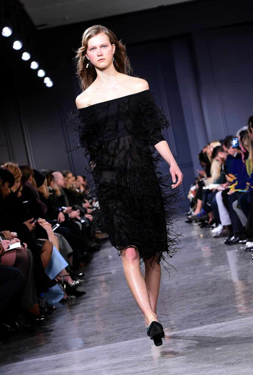 This striking off-the-shoulder dress by Jason Wu directs the eye to the model's collarbone,...