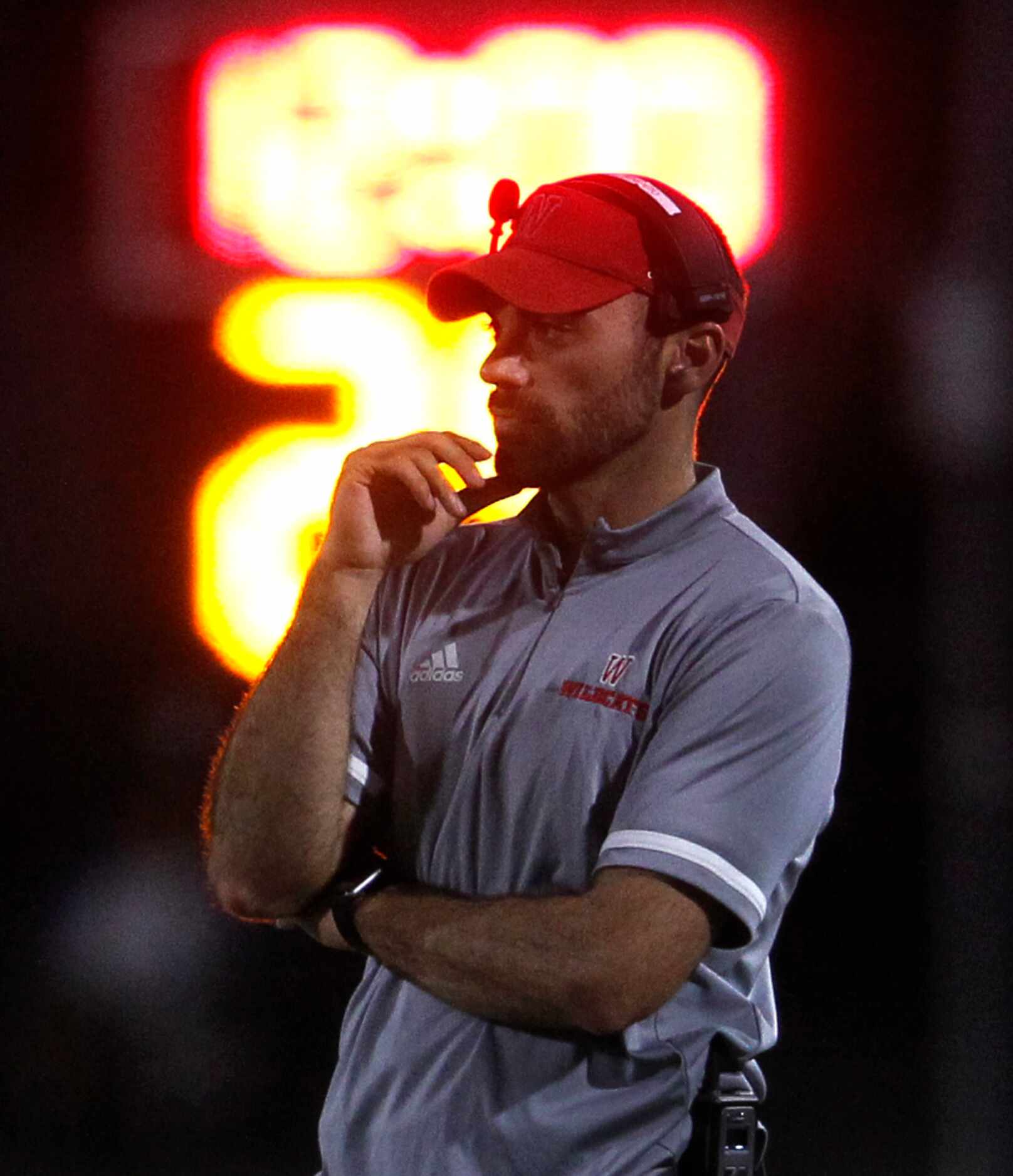 Dallas Woodrow Wilson head coach Tony Benedetto watches 2nd quarter play against Lancaster...