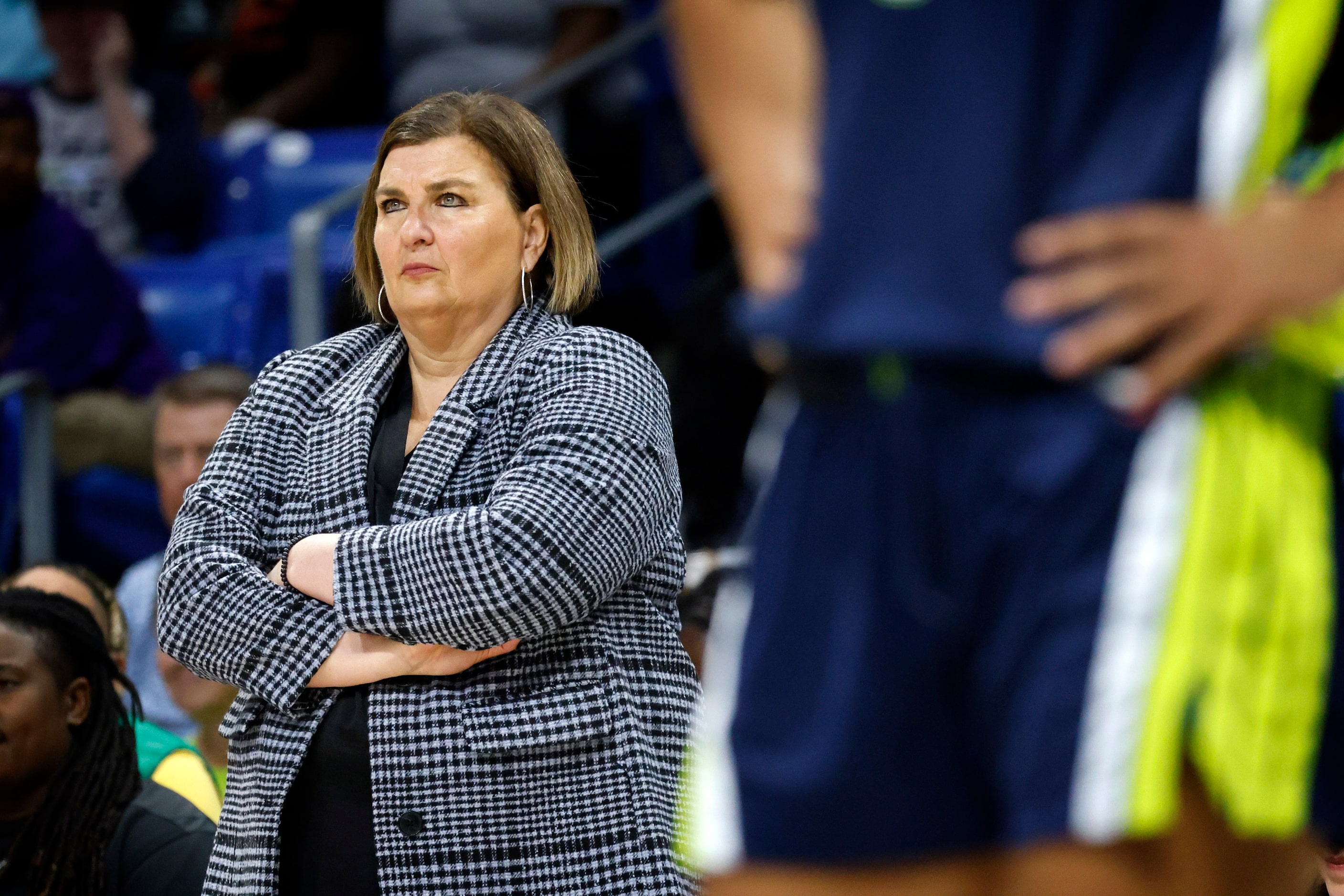 Dallas Wings head coach Latricia Trammell watches as he team faces the \Phoenix Mercury...