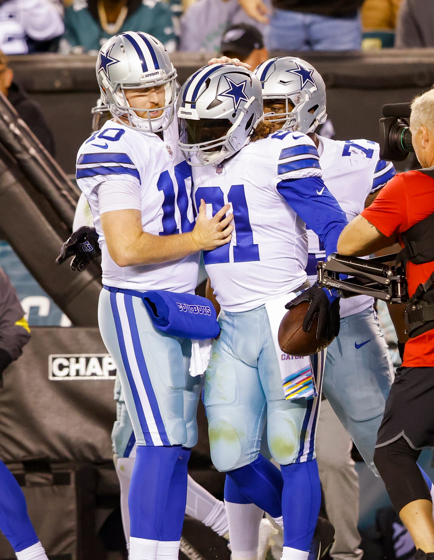 Dallas Cowboys quarterback Cooper Rush (10) celebrates with Dallas Cowboys running back...