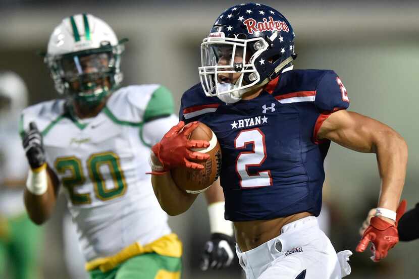 Denton Ryan wide receiver Billy Bowman Jr. (2) catches a pass and runs for a big gain...