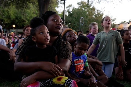 Journee Tripp and her mom Kendall Tripp check out the zombies and ghouls during the opening...