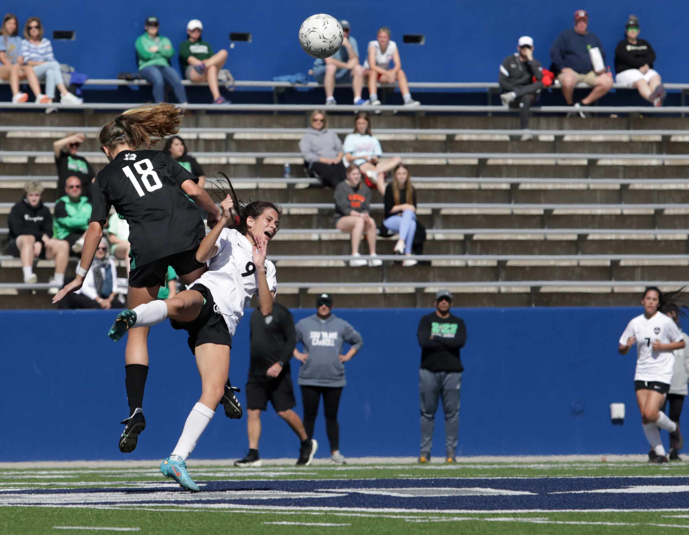 Southlake Carroll player #18, Parker Wilkerson, knocks down Flower Mound Marcus player #9,...