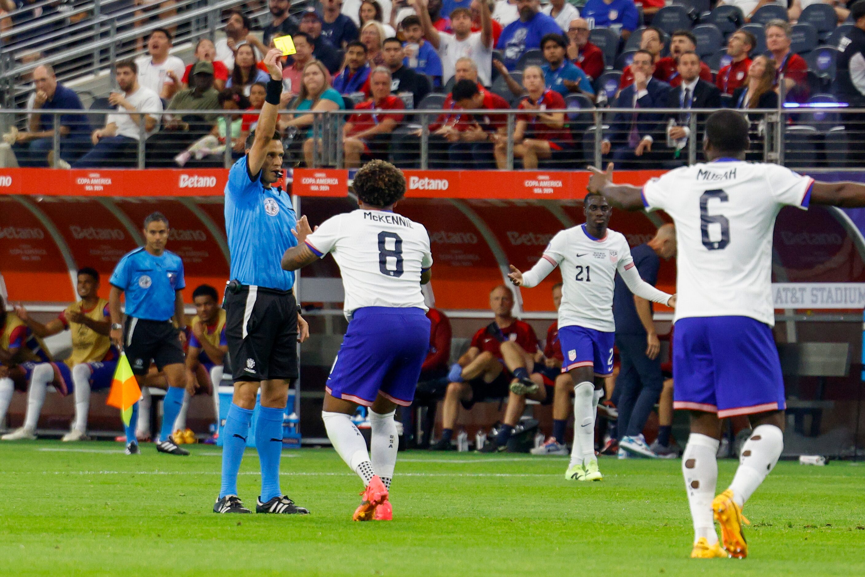 United States midfielder Weston McKennie (8) reacts after being given a yellow card by the...