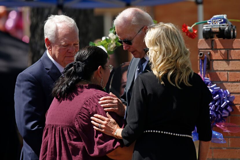 President Joe Biden and first lady Jill Biden comfort Robb Elementary School principal Mandy...