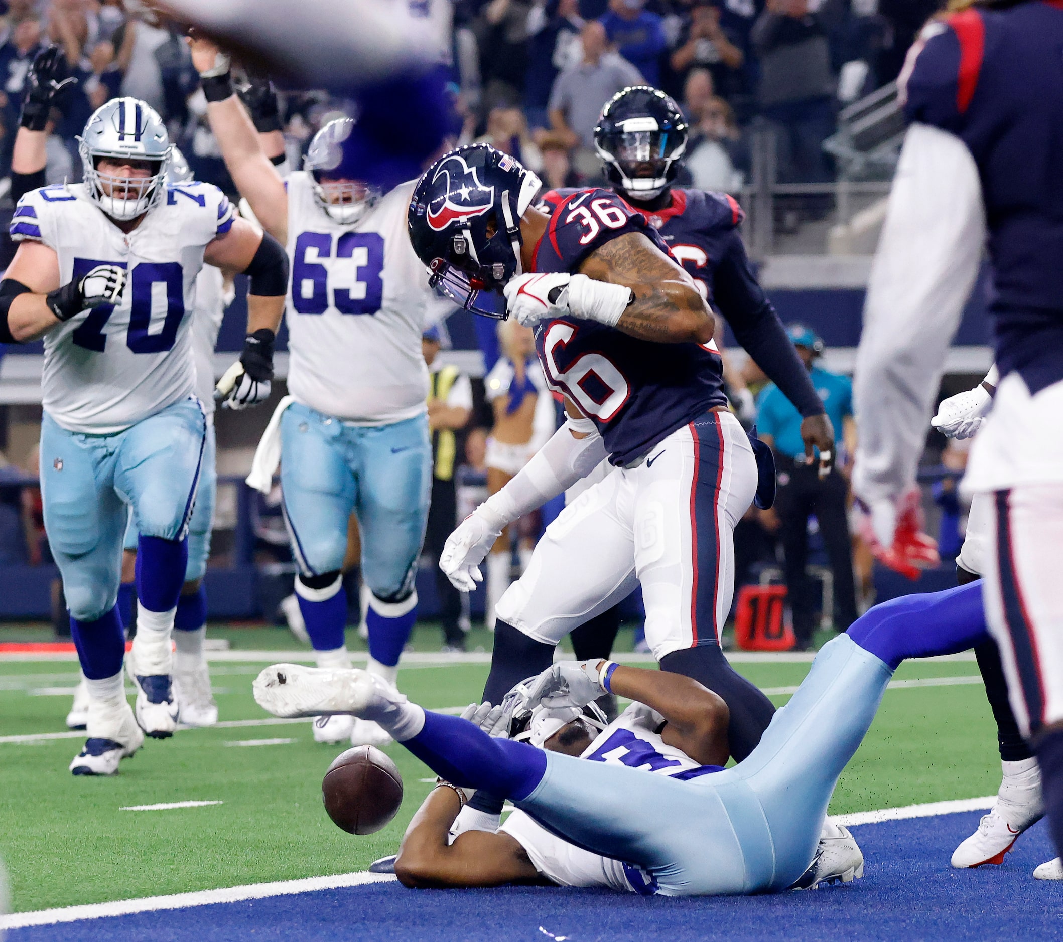 Dallas Cowboys wide receiver Michael Gallup (13) drops a touchdown pass after getting hit by...