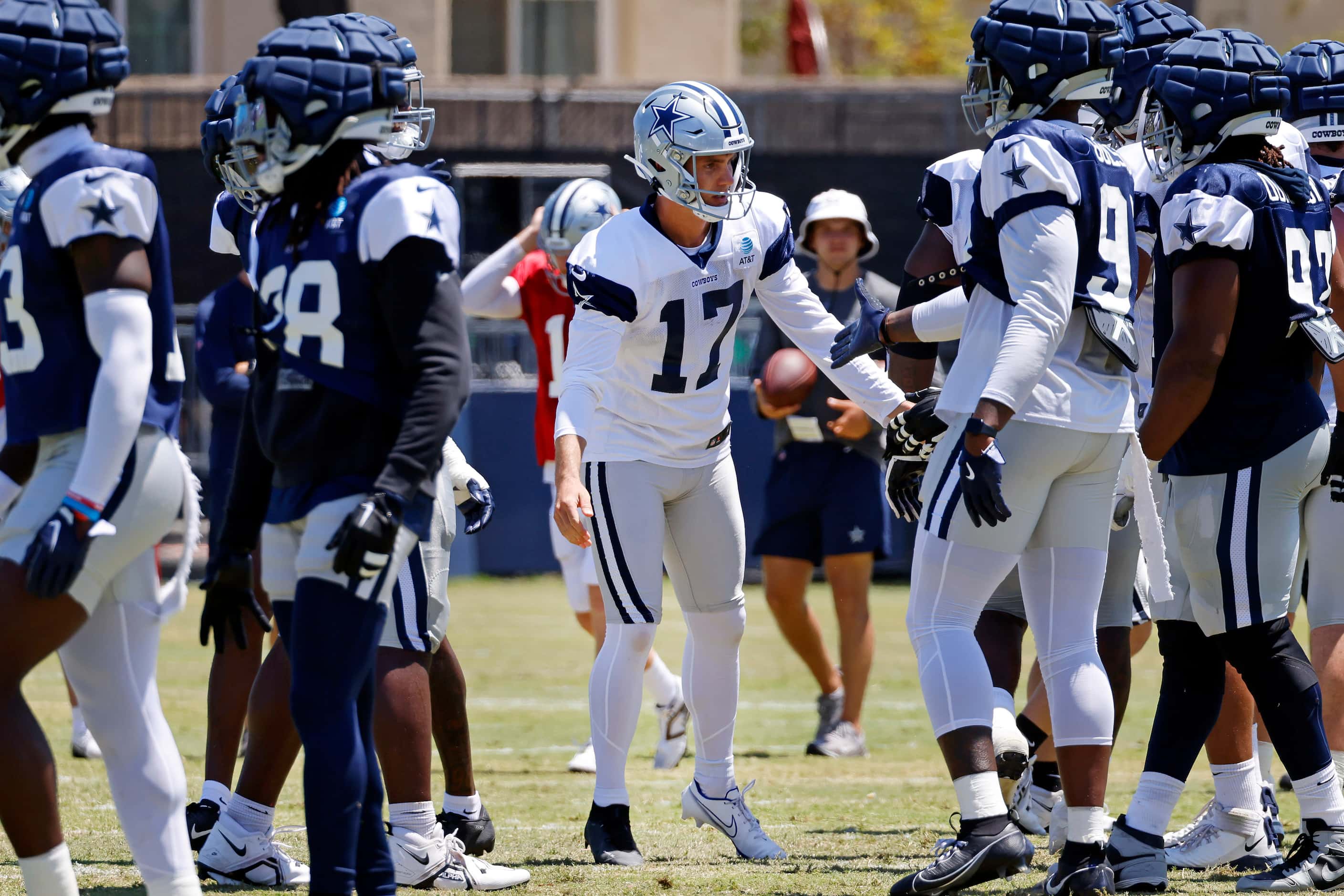 Dallas Cowboys place kicker Brandon Aubrey (17) is congratulated after kicking and making a...