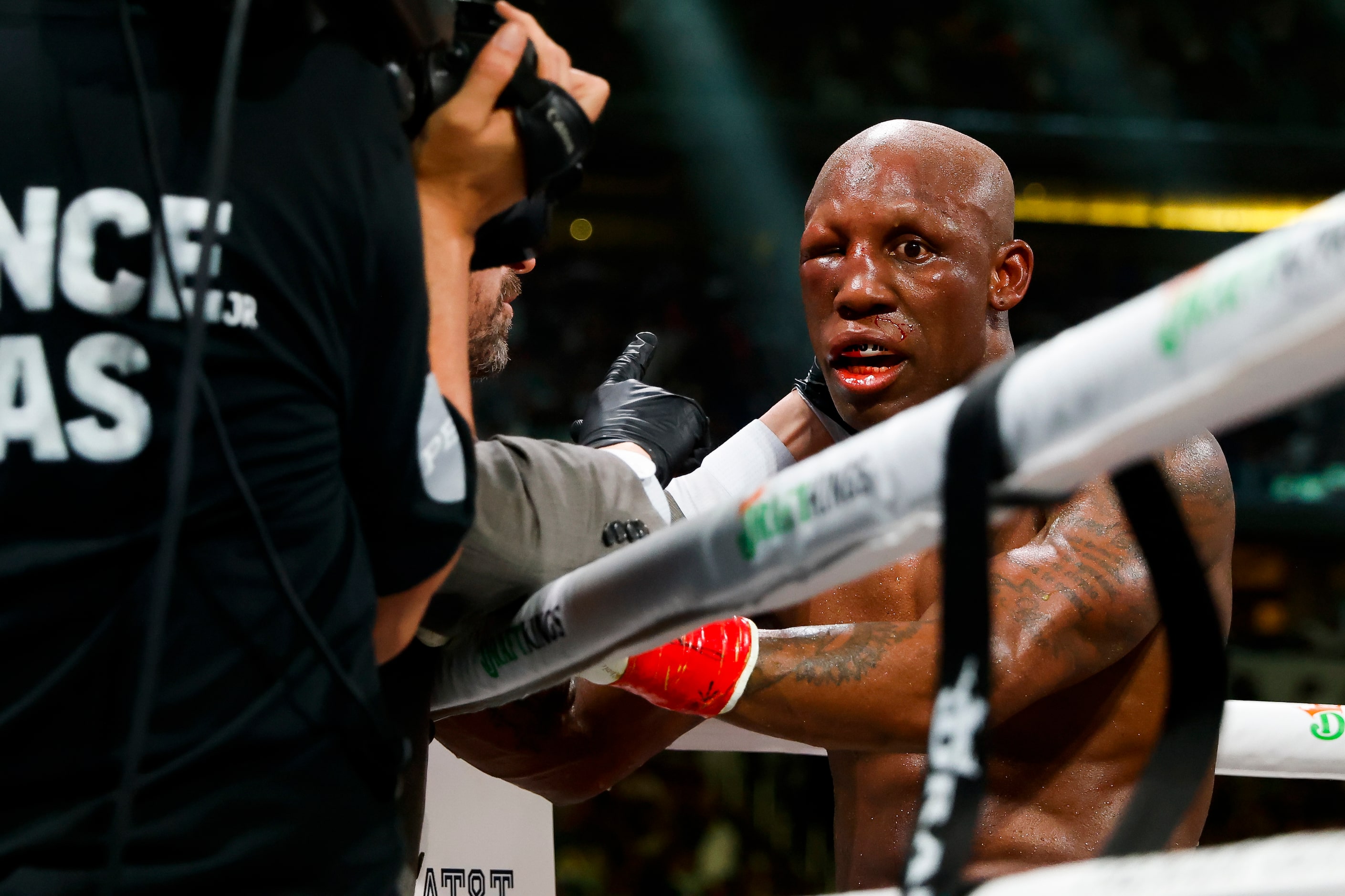 Yordenis Ugas is checked in the 10th round of a welterweight championship boxing match...