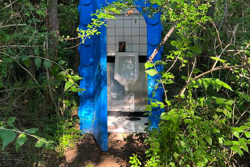 Isaac Dunne's "Porta Potty (Club Dallas)" is among the works on display at Sweet Pass...