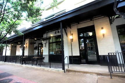 San Marzano, a new restaurant in Dallas' West Village, is hidden behind some trees east of...