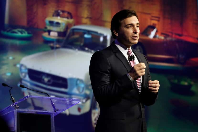 FILE - In this April 16, 2014 file photo, Ford Motor Company Chief Operating Officer Mark...