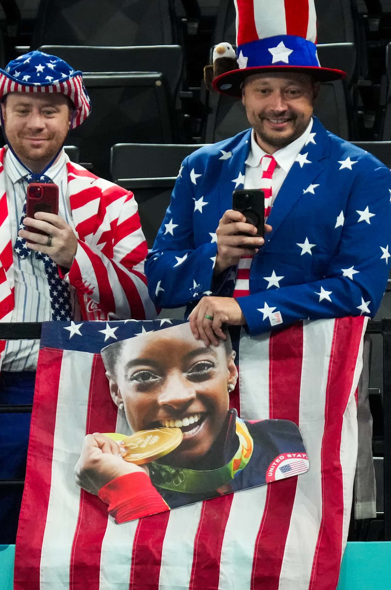 Fans cheer Simone Biles of the United States during women’s gymnastics qualifying at the...