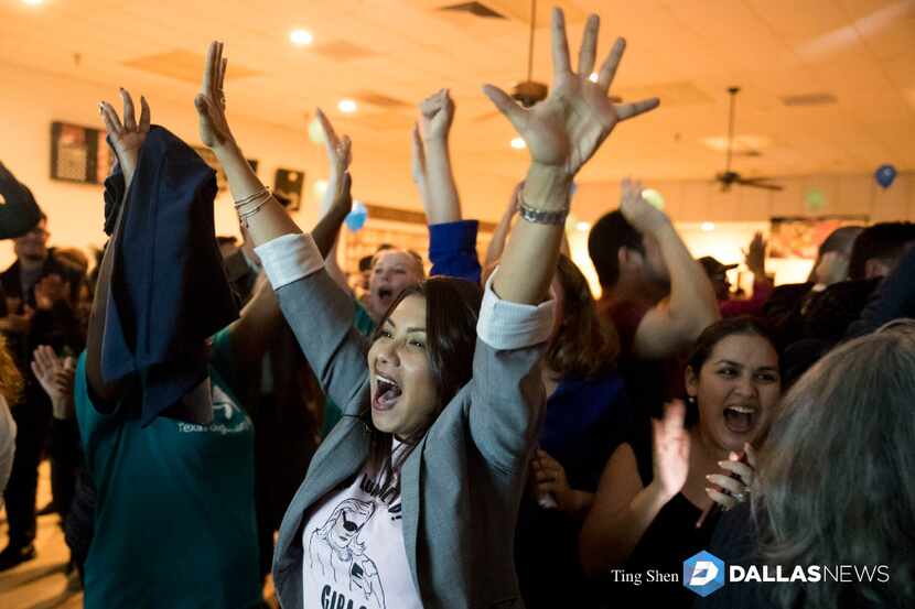 Dallas Justice of the Peace Sara Martinez celebrates with other supporters of Democrat...