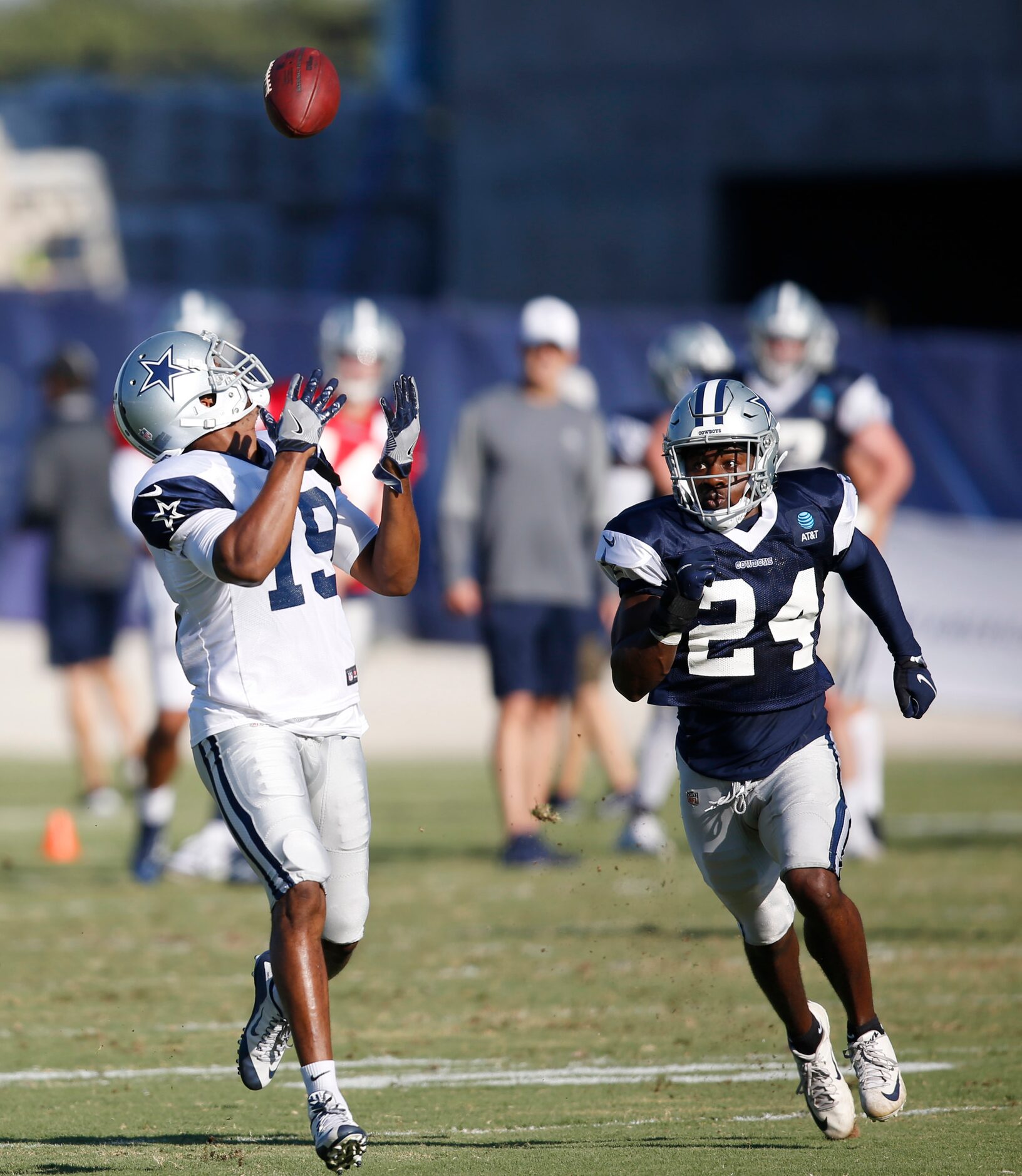 Dallas Cowboys wide receiver Amari Cooper (19) prepares to catch a pass in front of Dallas...