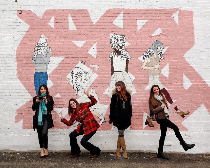  Artists Sara Reyes, Jane Beaird, Lesli Marshall and Emma Miller pose in front of Beaird's...