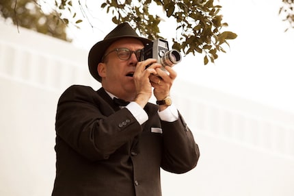 Actor Paul Giamatti plays Abraham Zapruder in a scene from the movie Parkland.