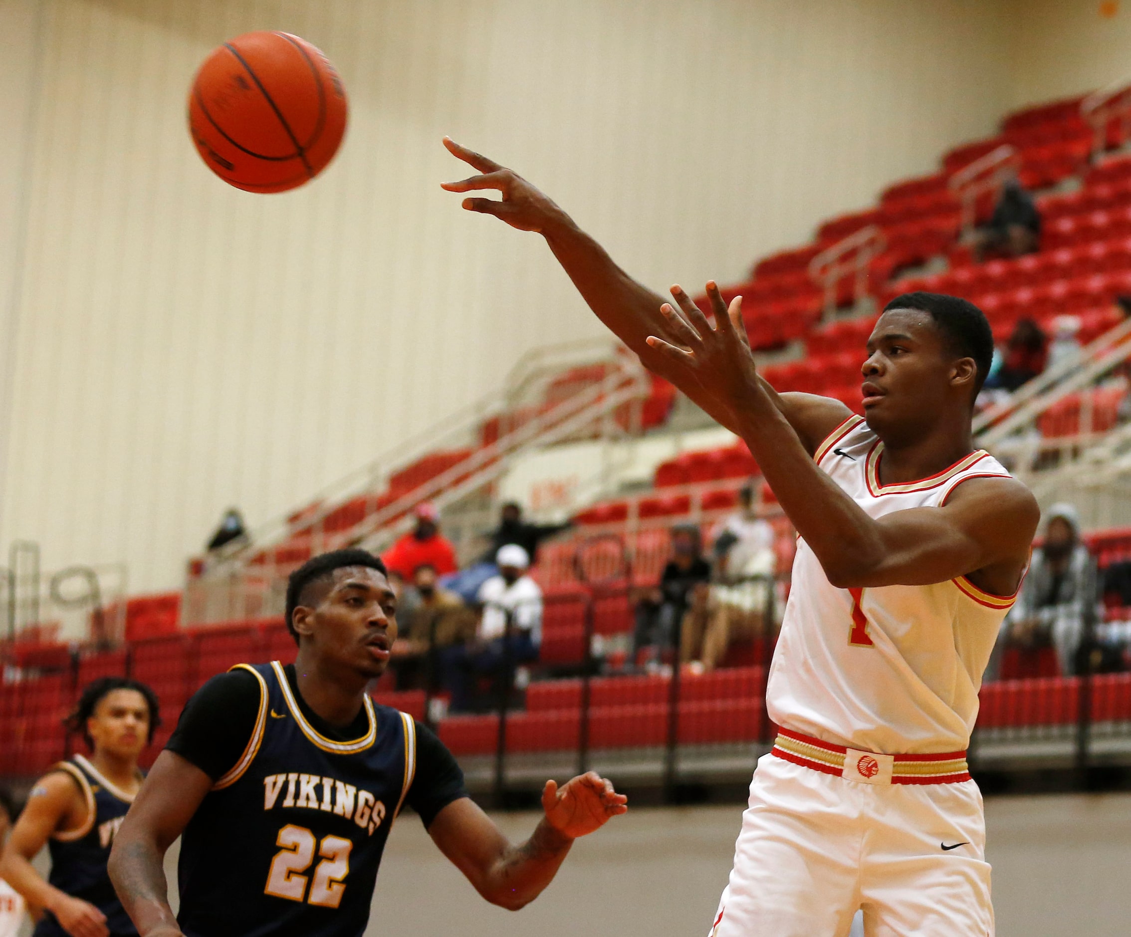 South Grand Prairie's Jaden Flournoy (1) passes as  Arlington Lamar's Cameron Brady (22)...