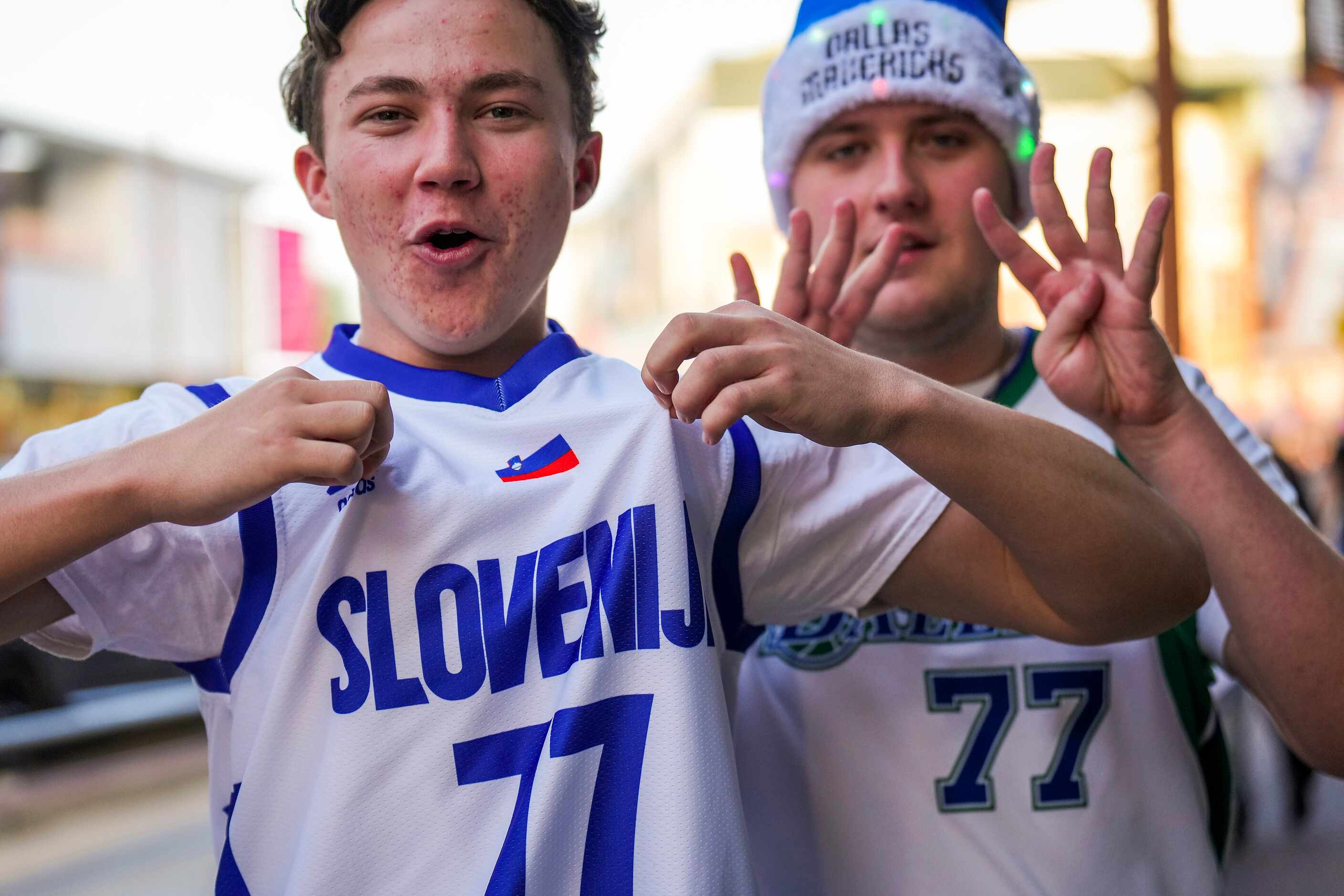 Dallas Mavericks fans  Tugg Hull (left) and Scott Yager show off their Luka Doncic #77...