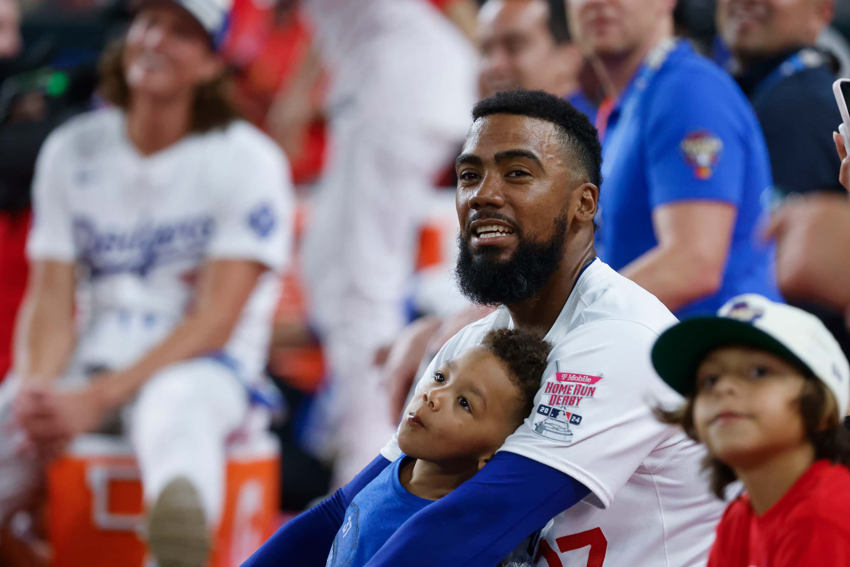 Teoscar Hernandez, of Los Angeles Dodgers sits by the sideline during the semi final of MLB...