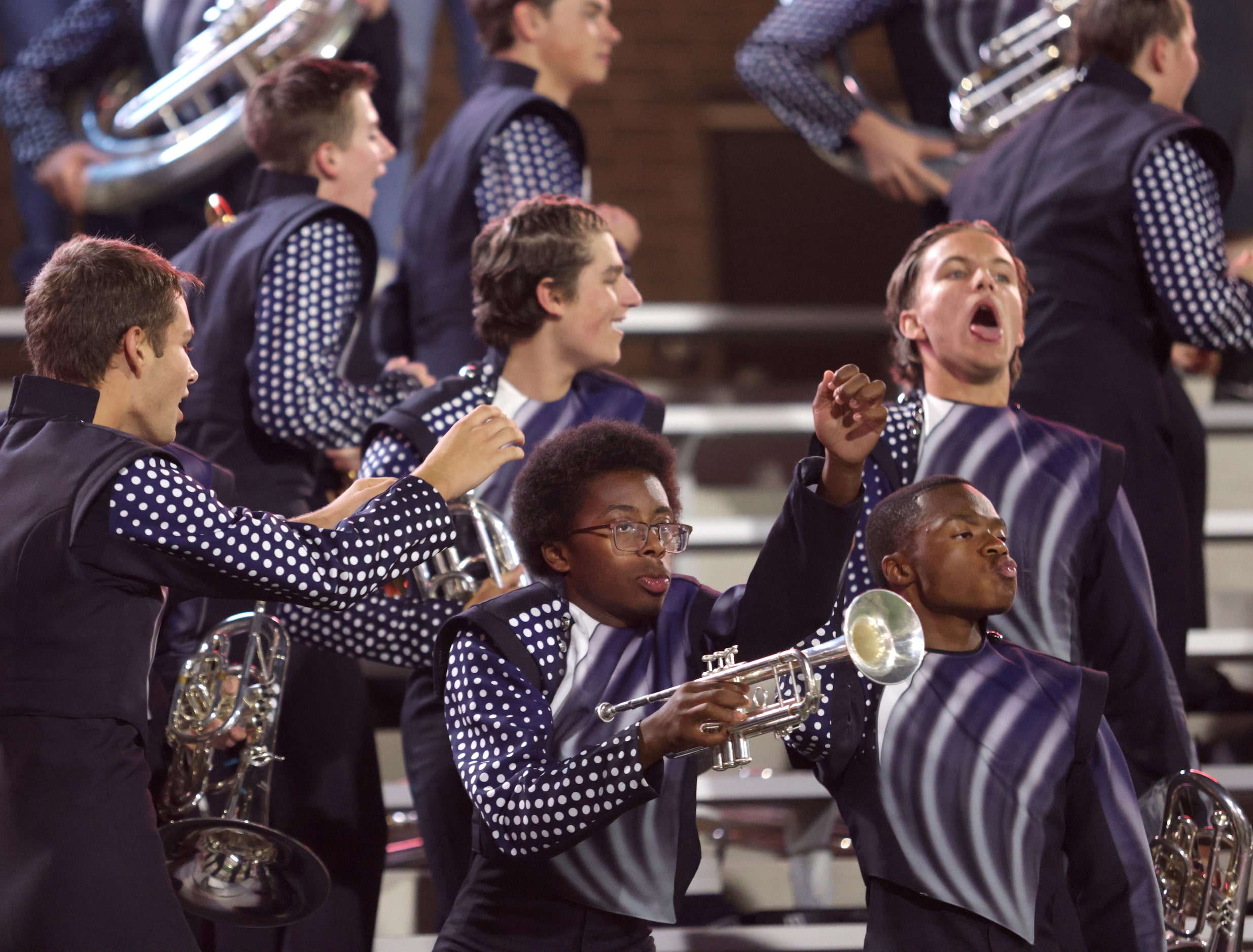 The Walnut Grove band celebrates a run during the Prosper Walnut Grove High School at...