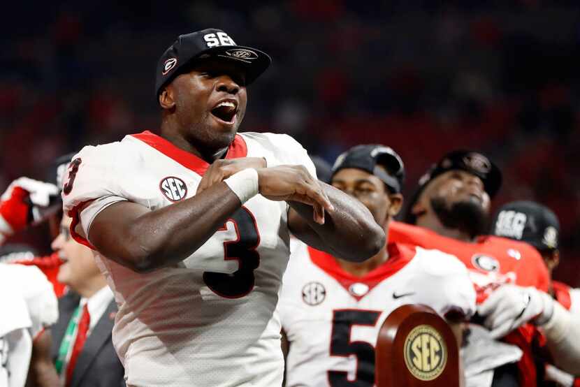 ATLANTA, GA - DECEMBER 02: Roquan Smith #3 of the Georgia Bulldogs reacts to winning the...