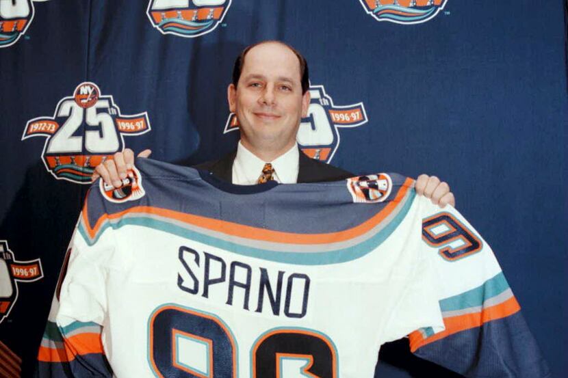 In this Nov. 26, 1996 photo, John Spano, holds a New York Islanders jersey at the Nassau...