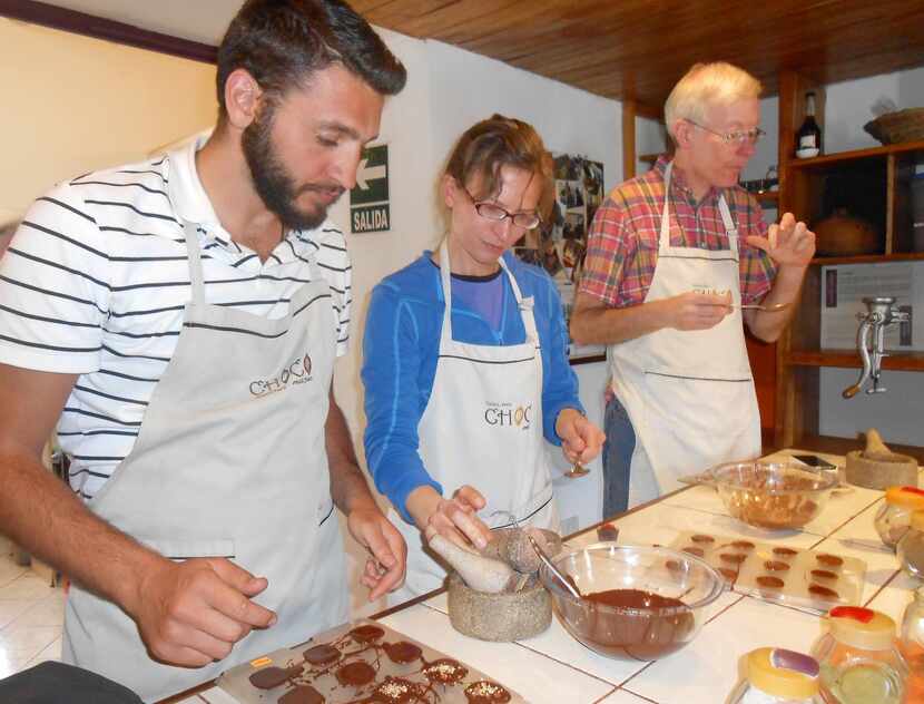 Left:  Students work on their handcrafted chocolates at the popular chocolate-making classes...