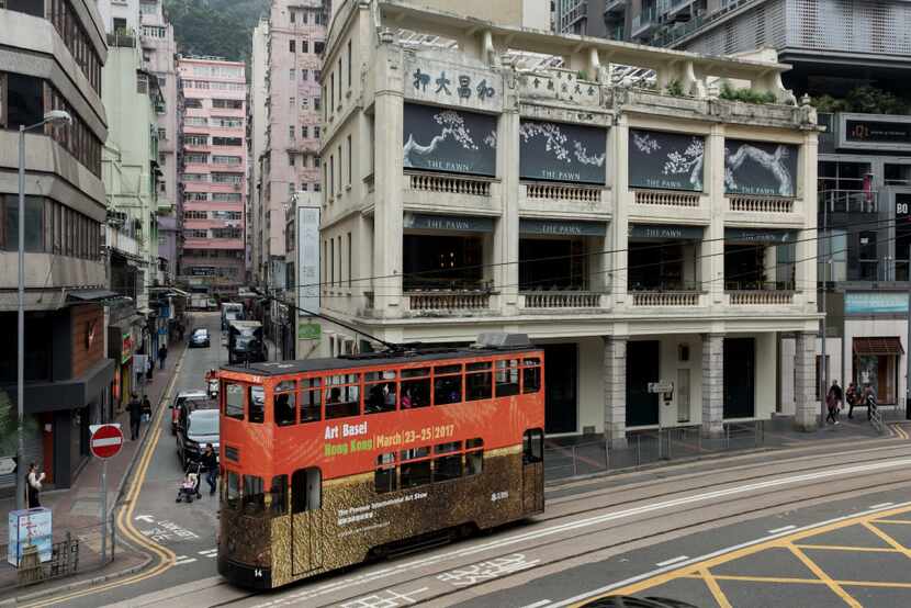 A doubledecker bus promotes Art Basel 2017 in Hong Kong.