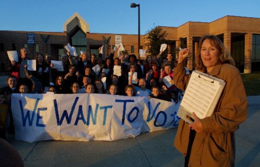 This 2002 photo shows how Brenda Rizos' civic activism began. She led a petition drive...