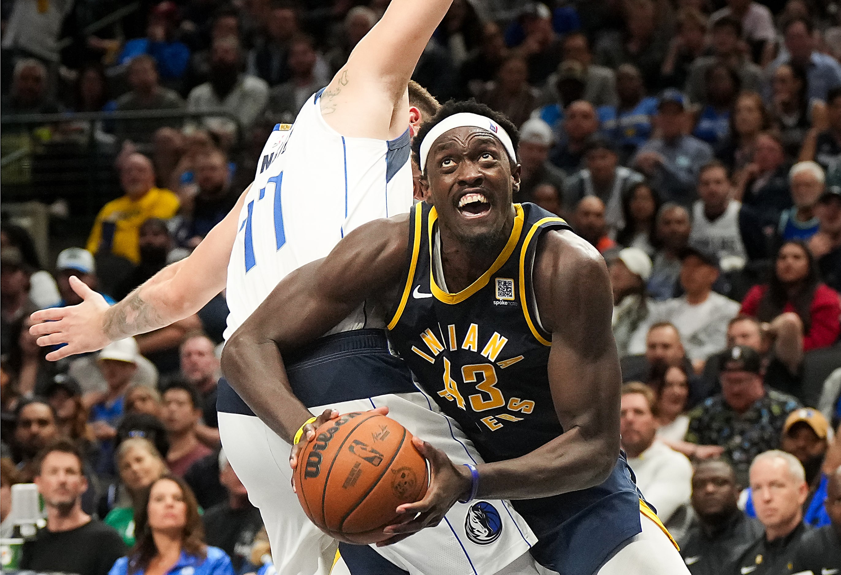 Indiana Pacers forward Pascal Siakam (43) drives to the basket around Dallas Mavericks guard...